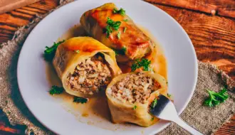 Bison Stuffed Cabbage Rolls Wrapped in Bacon