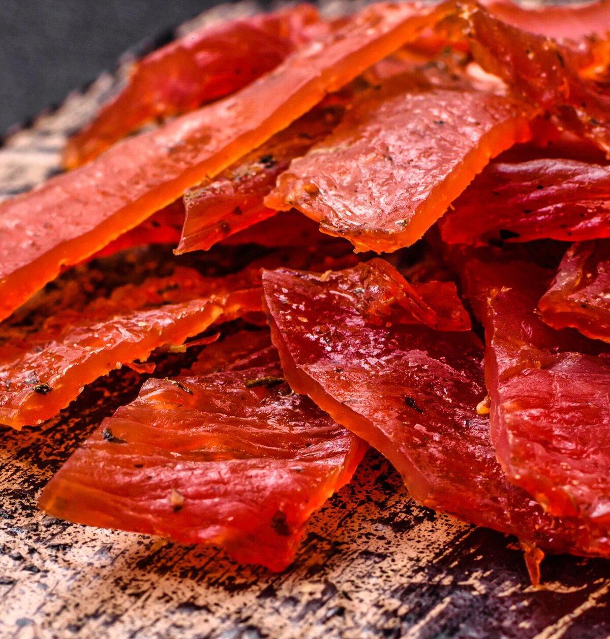 a pile of jerky on a plate - Pemmican Ground Venison Jerky Recipes